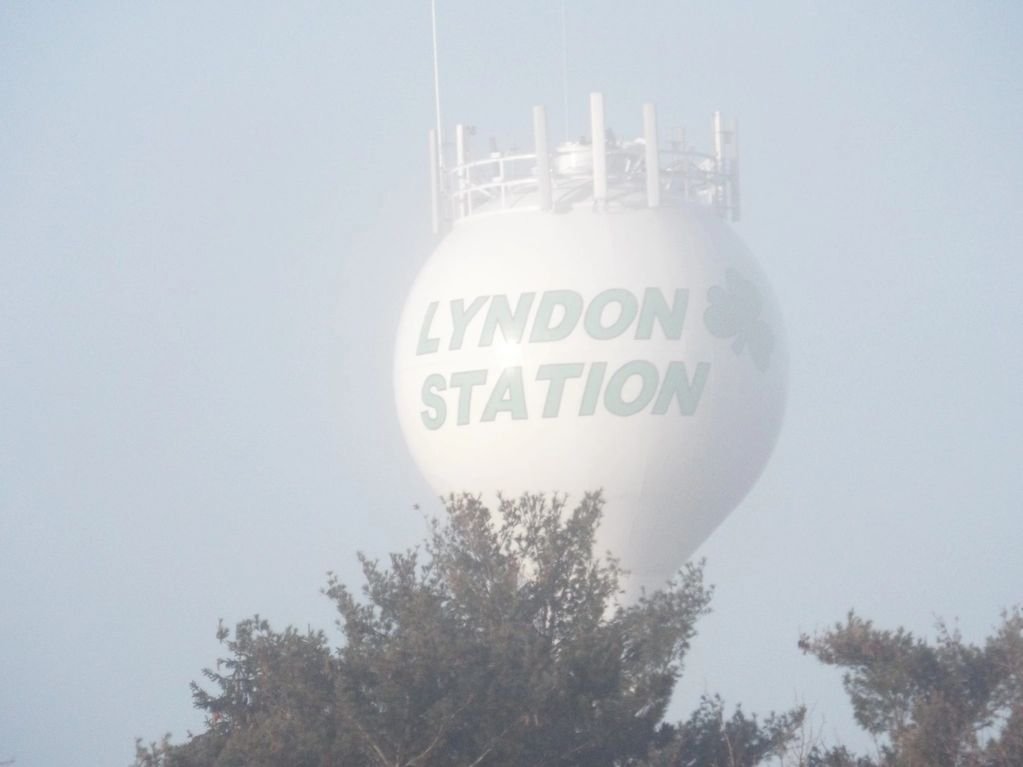 Lyndon Station water tower in morning fog